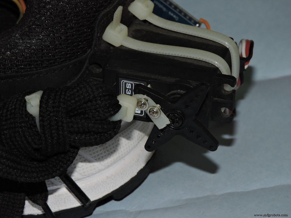 Smart Self‑Lacing Shoes with Built‑In Energy Harvesting