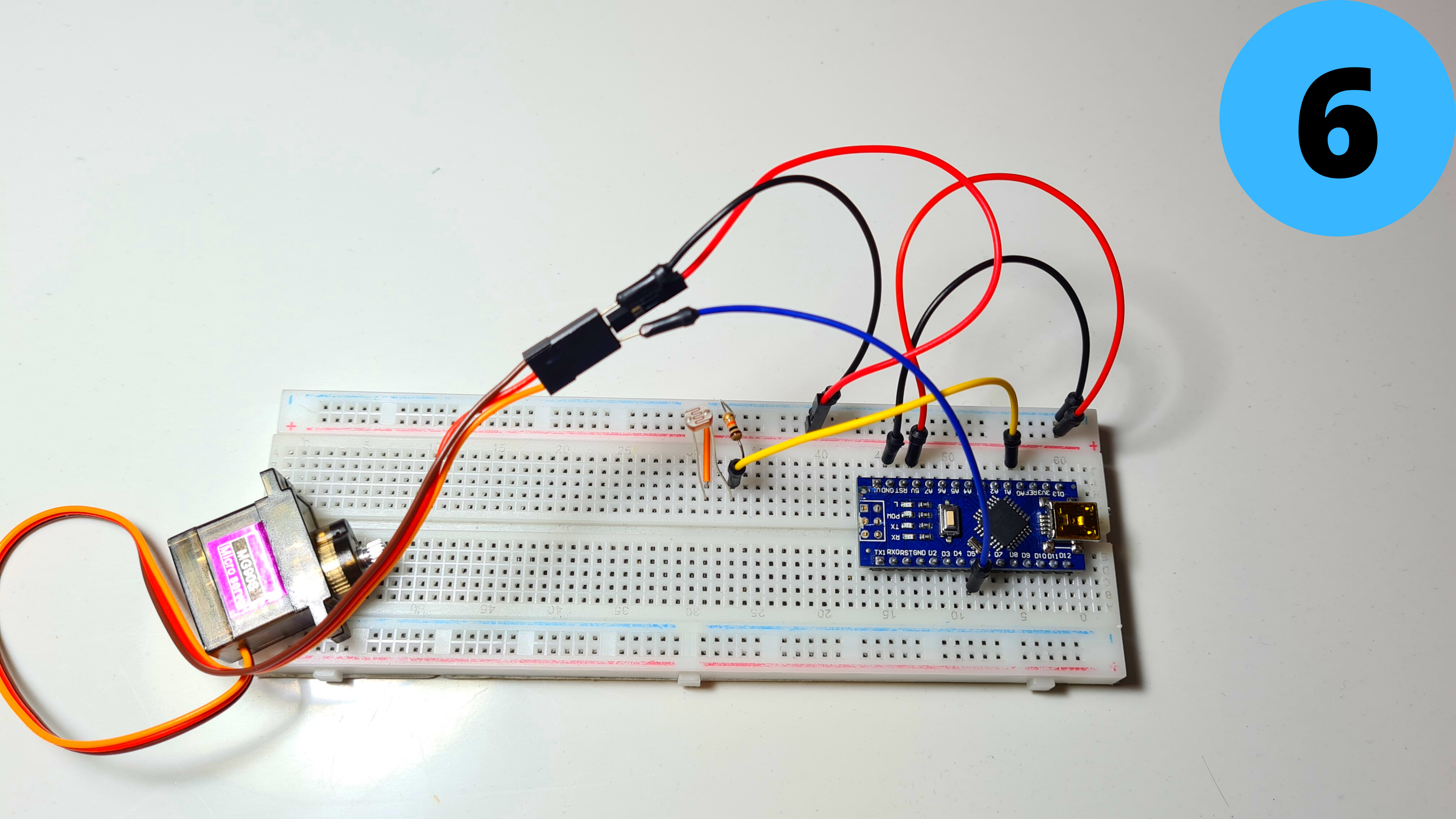 Arduino‑Powered Smart Pull‑Up Bar with Audio Feedback and Light Sensor