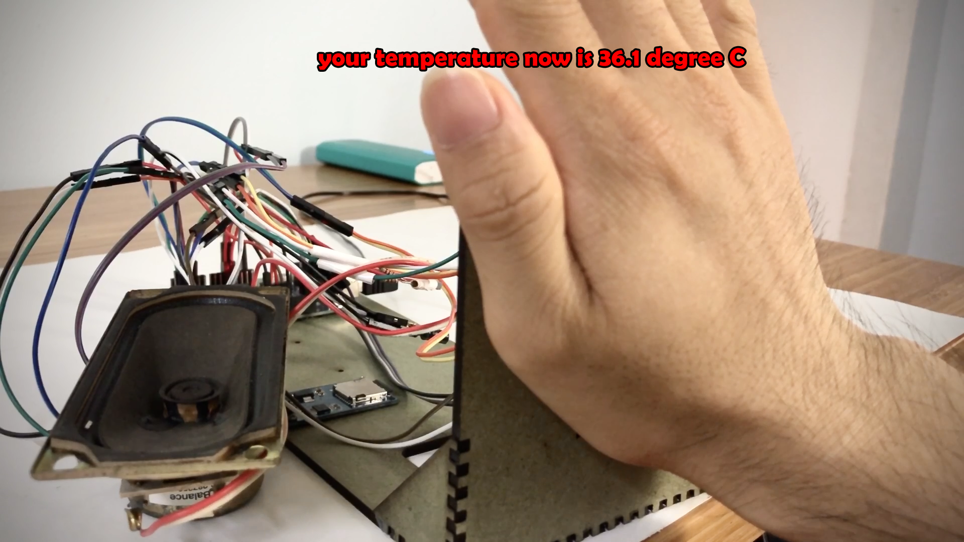 Automatic Temperature Measurement with Voice Alerts