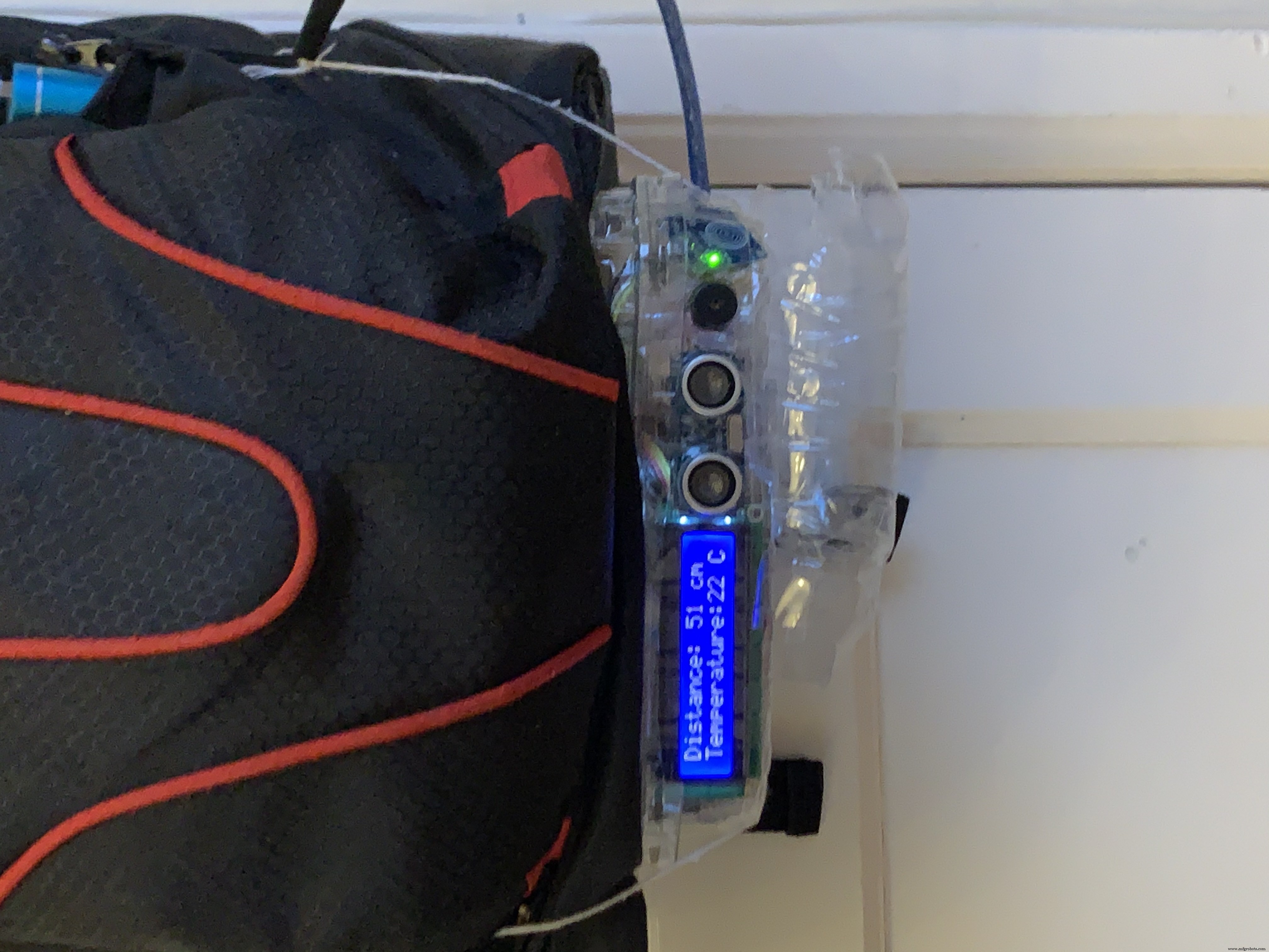 Arduino-Based Social Distancing Reminder System for COVID-19