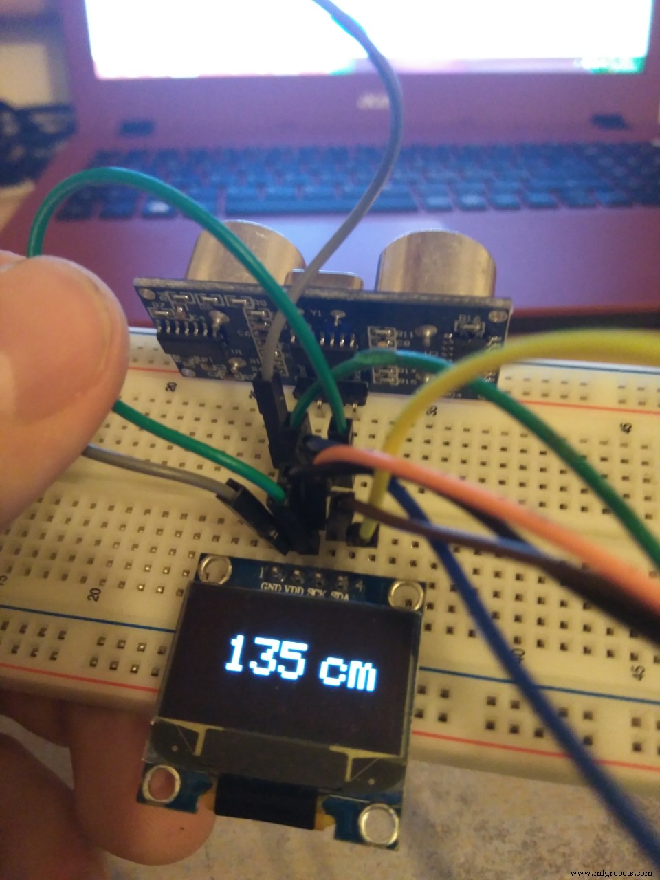 Arduino UNO: Distance Measurement Using HC‑SR04 Ultrasonic Sensor and Adafruit OLED Display