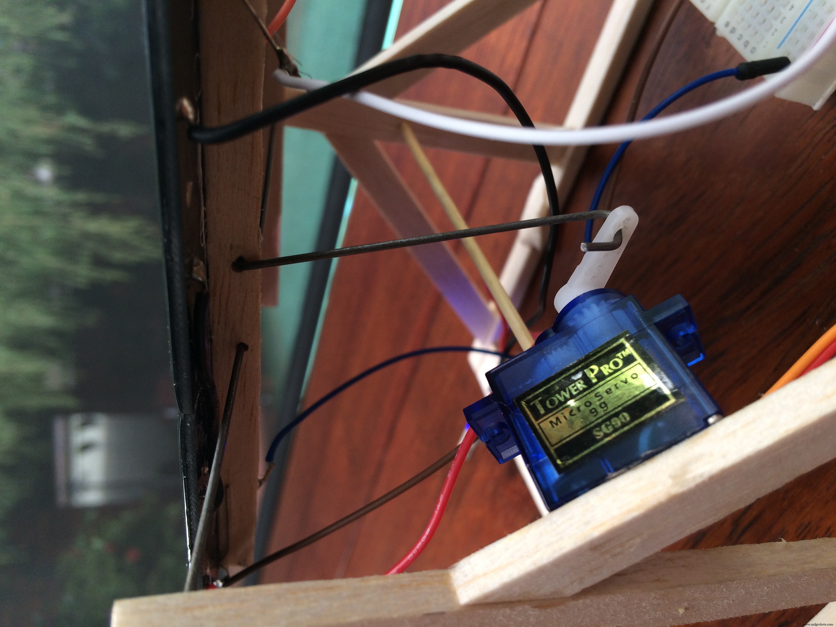Portable Solar Tracker Phone Charger with Arduino and Servo Control