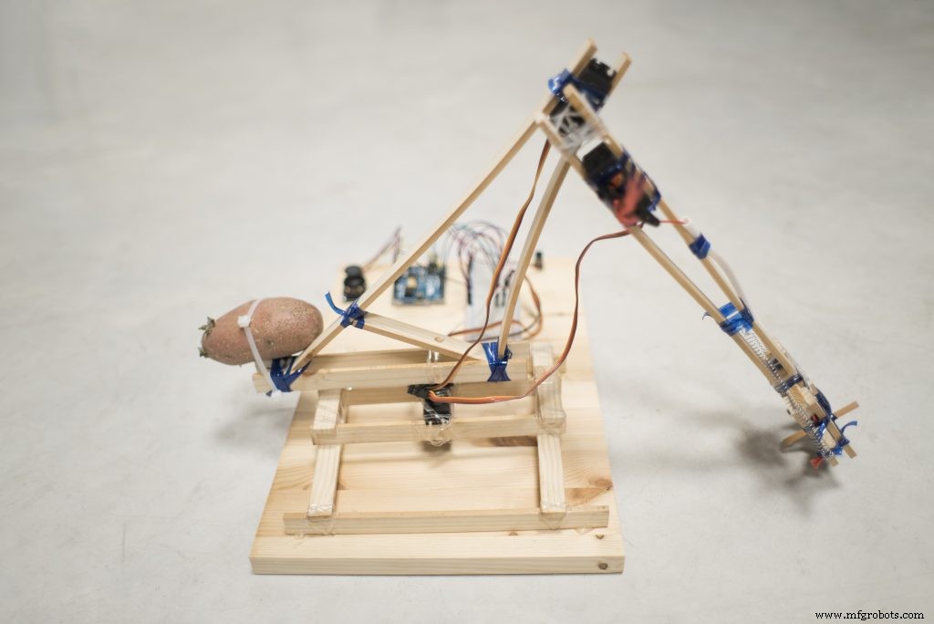 Build an Arduino Robot Arm Using Recycled Materials
