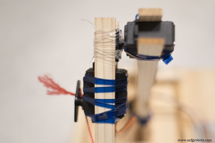 Build an Arduino Robot Arm Using Recycled Materials