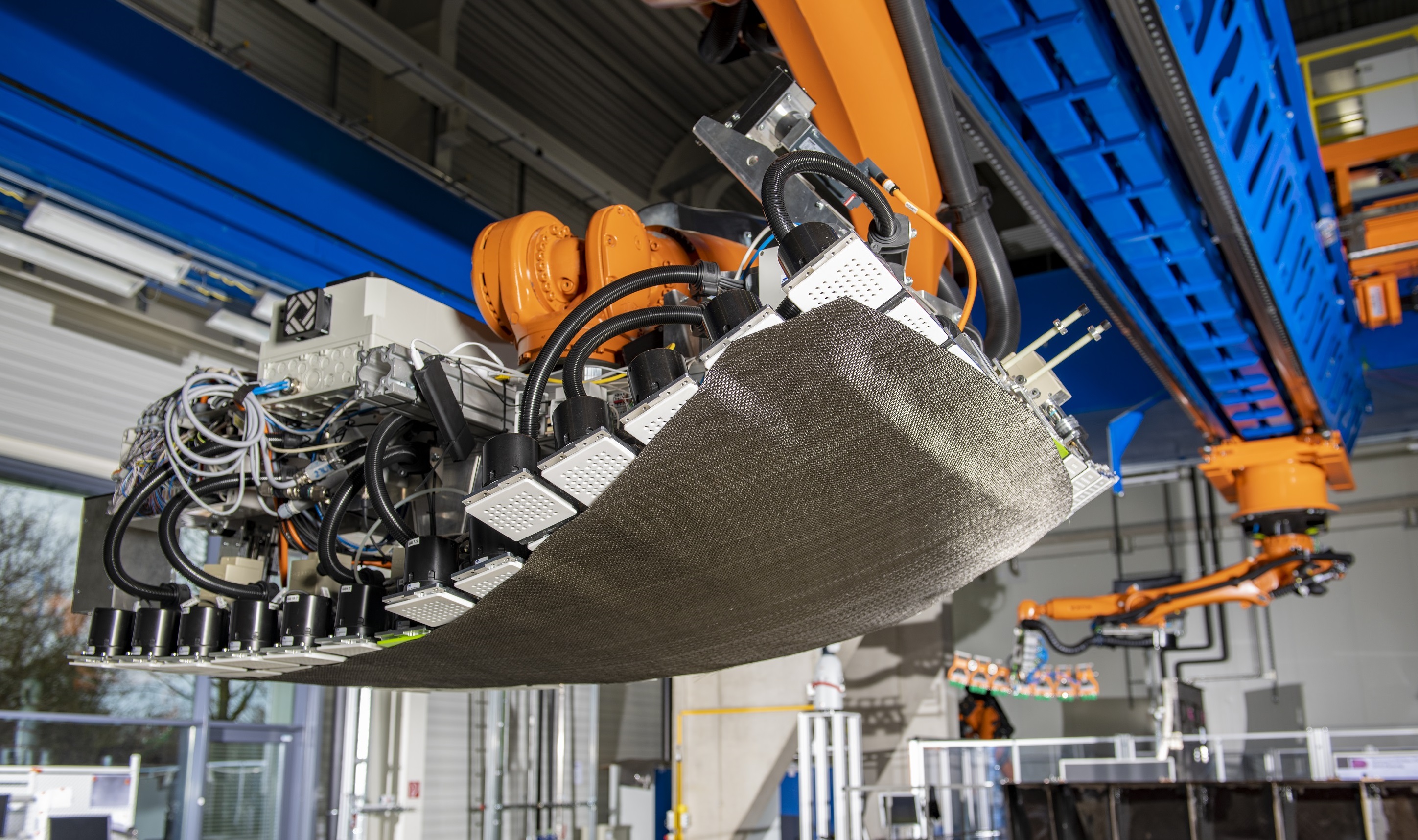 Automated Aerocomposites Production: Liquid Molding vs. Welded Thermoplastics – A Strategic Overview