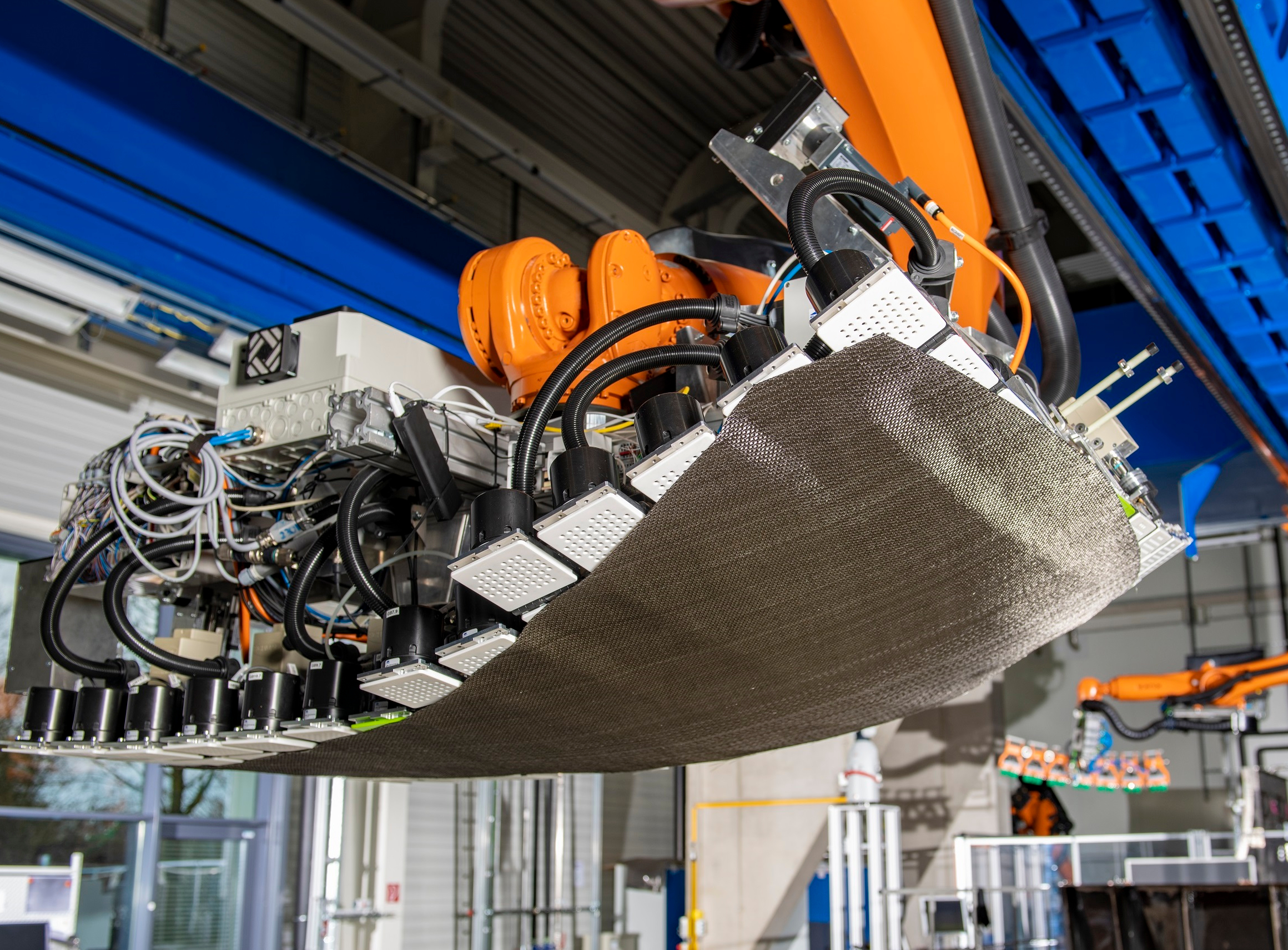 DLR s Flappybot: Revolutionizing Composite Manufacturing at the 2019 Convention