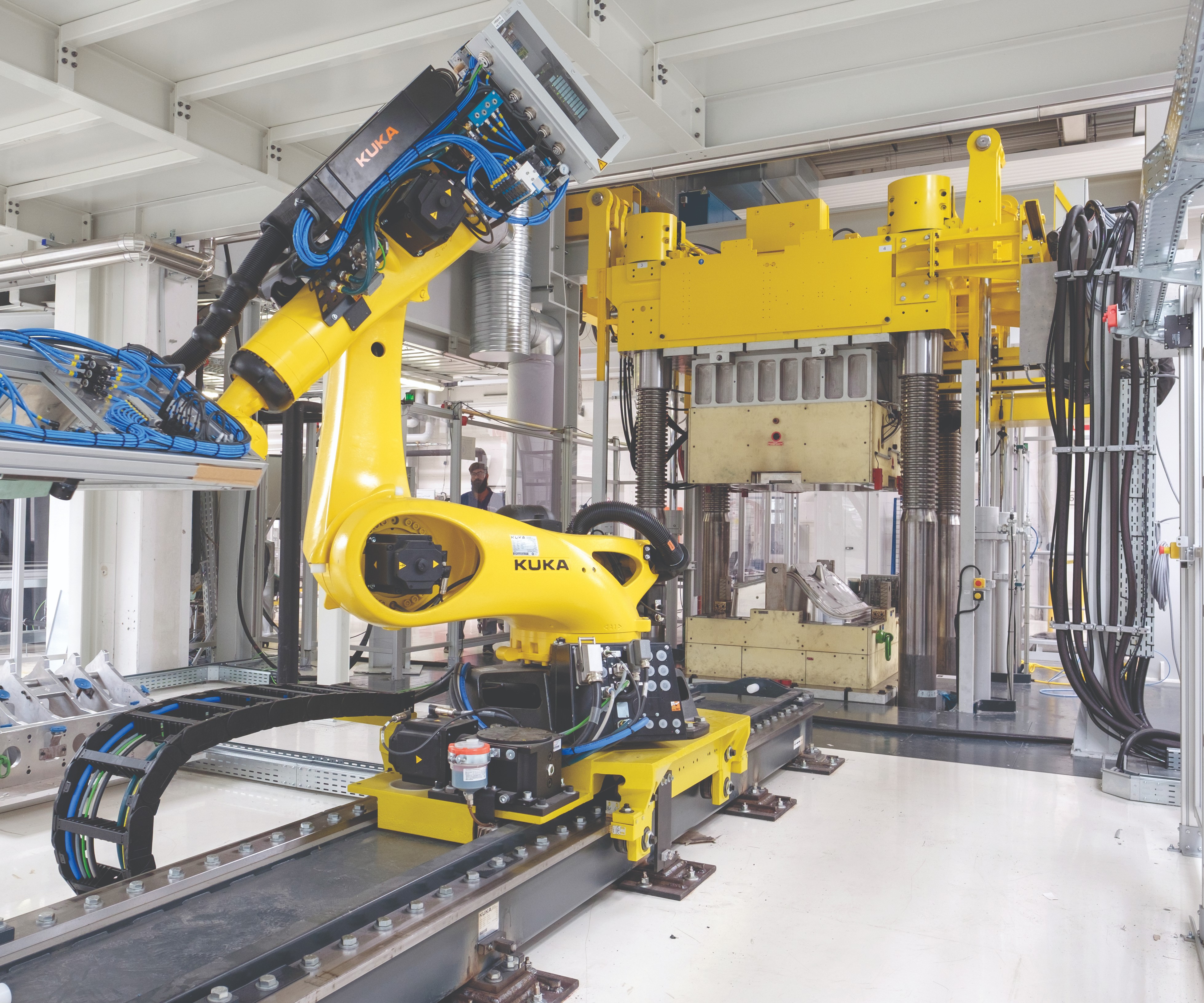 BMW s End-to-End CFRP Production: From Tow to Tape to Final Part