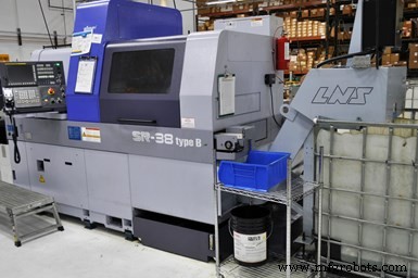 Why a Filtering Chip Conveyor Is Essential for CNC Lathe Operations